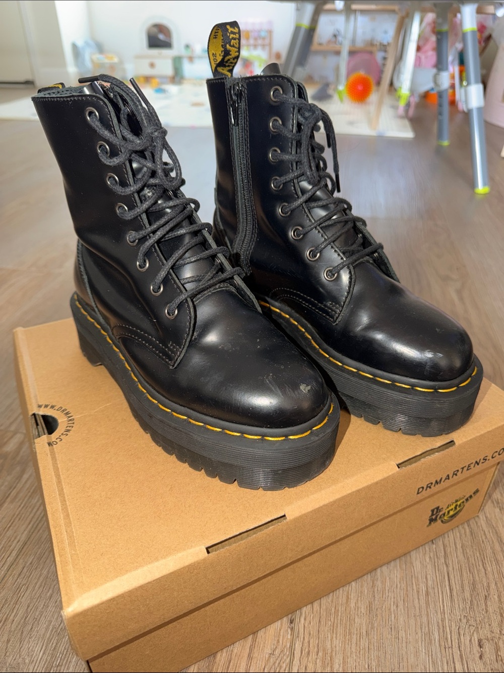 Dr. Martens Black Leather Platform Lace-Up Boots with Yellow Stitching